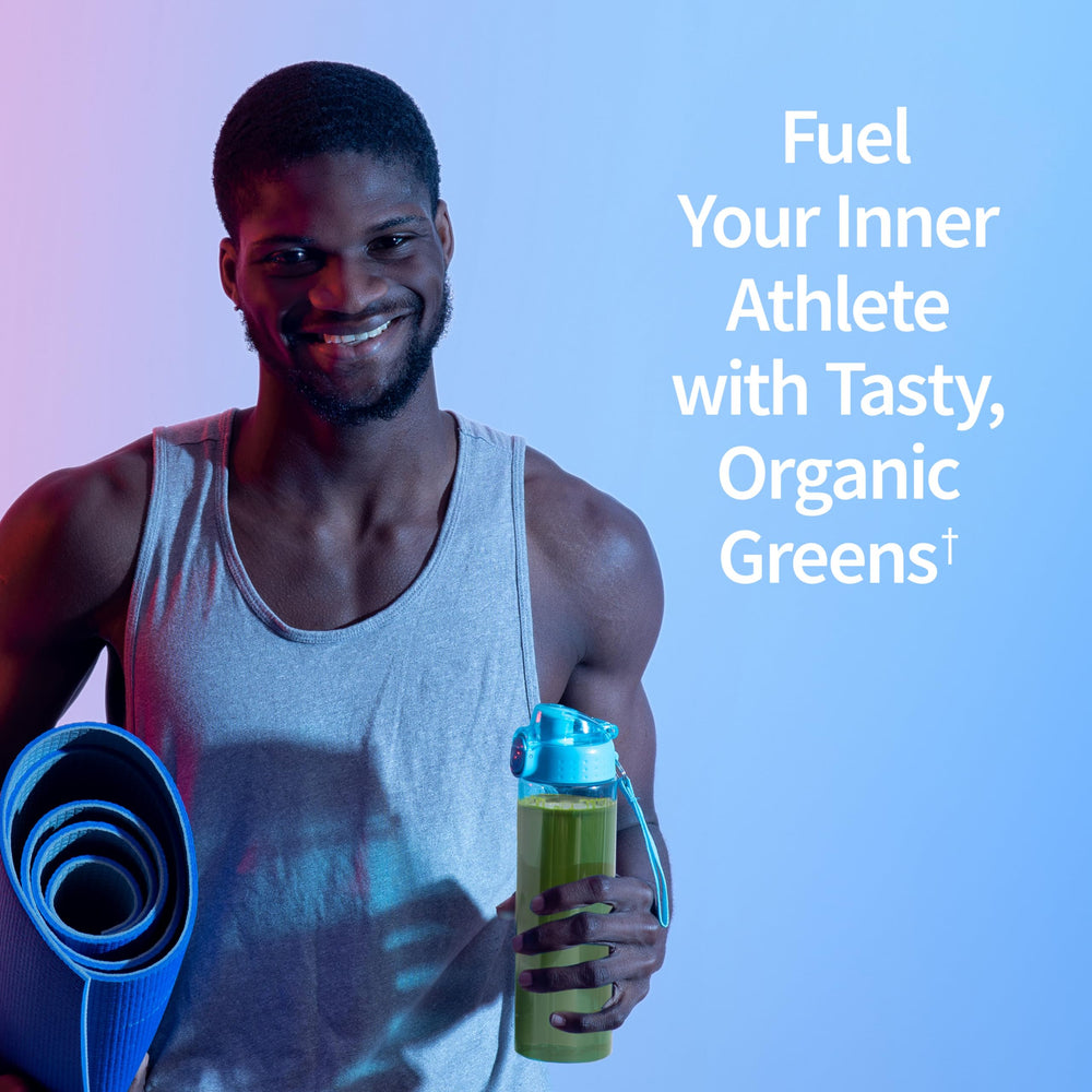 Garden of Life Sport Greens Apple Berry shake in glass, vibrant and refreshing for post-workout refreshment.