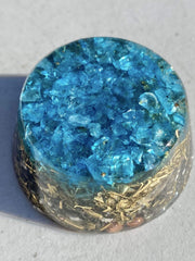 Generic Blue Topaz orgonite display brightening a shelf or altar area