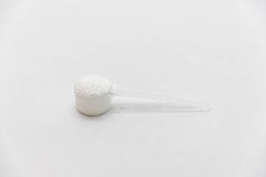 Genetic Edge Compounds Creatine HCl HMB athlete training with bottle.