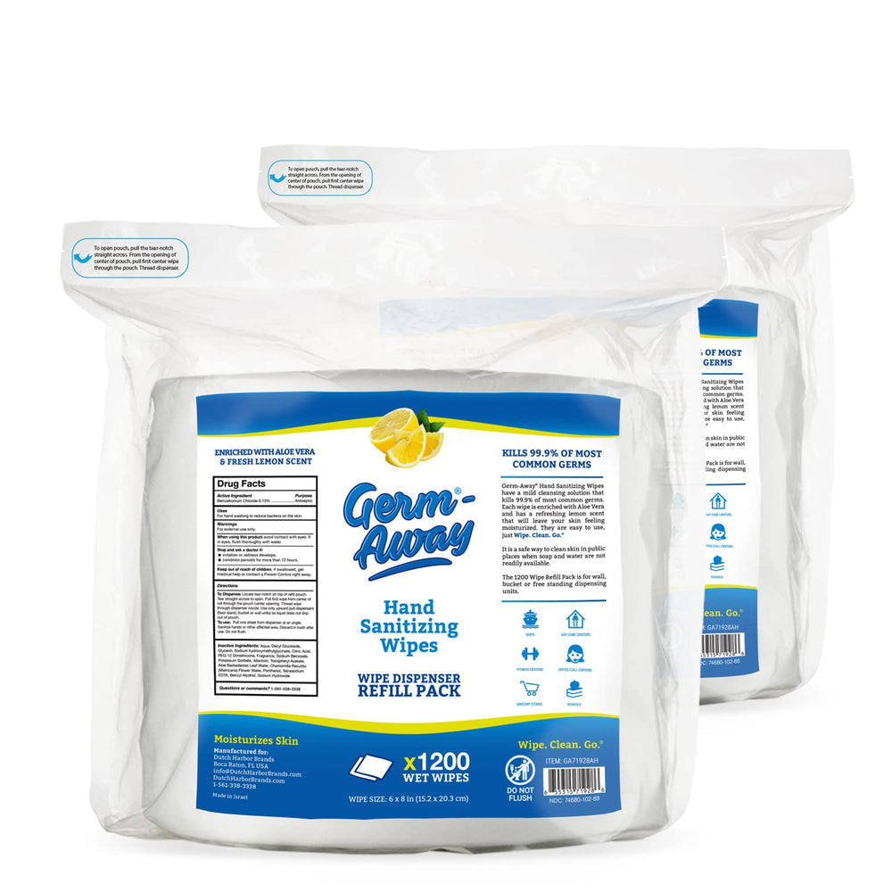 Germ-Away hand wipes with lemon scent beside a dispenser for quick sanitization.