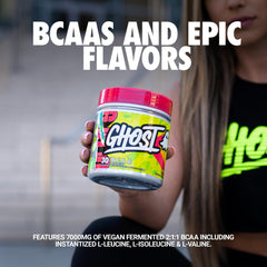 GHOST BCAA Lemon Crush scoop beside a shaker for intra-workout amino boost