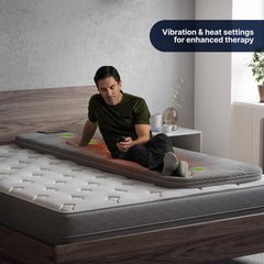GhostBed massage mat on a bed 78 inches by 29 inches for spacious relief.