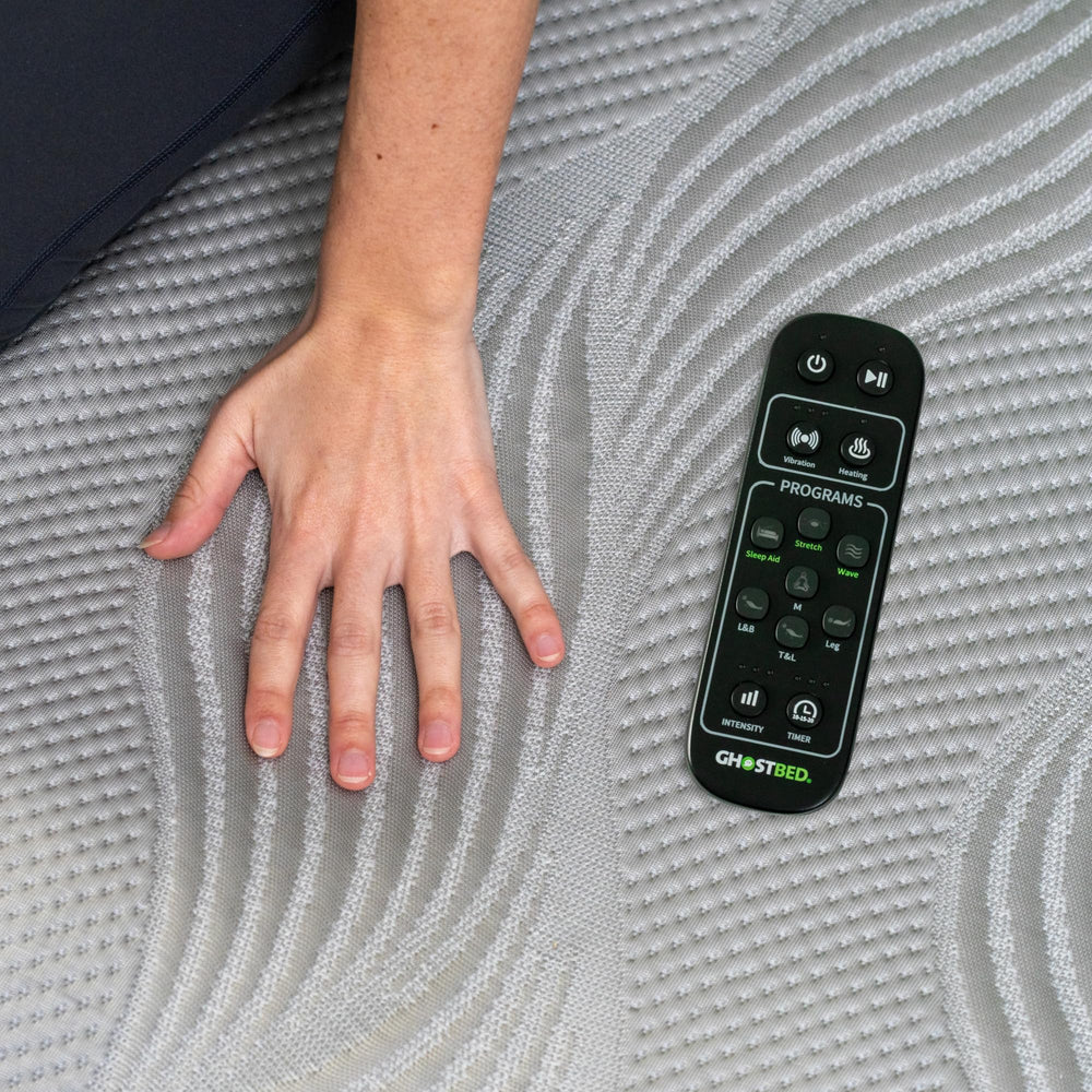 GhostBed massage mat with wireless remote for easy control.