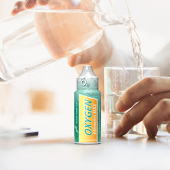 GHT Oxygen Elements Max active-use scene with glass and towel background.