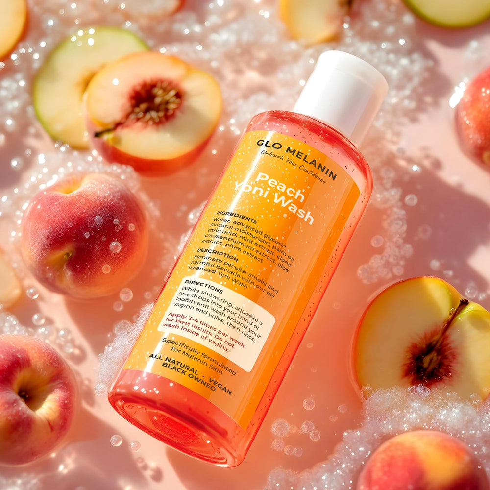 Glo Melanin Peach Yoni Wash label highlights all-natural ingredients and brand commitment.