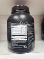 Measuring cup showing powder portion of GNC AMP Wheybolic