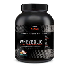 GNC AMP Wheybolic coconut caramel tub ready for post-workout use
