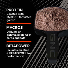 GNC AMP Mass XXX shaker cup with powder ready for mixing.