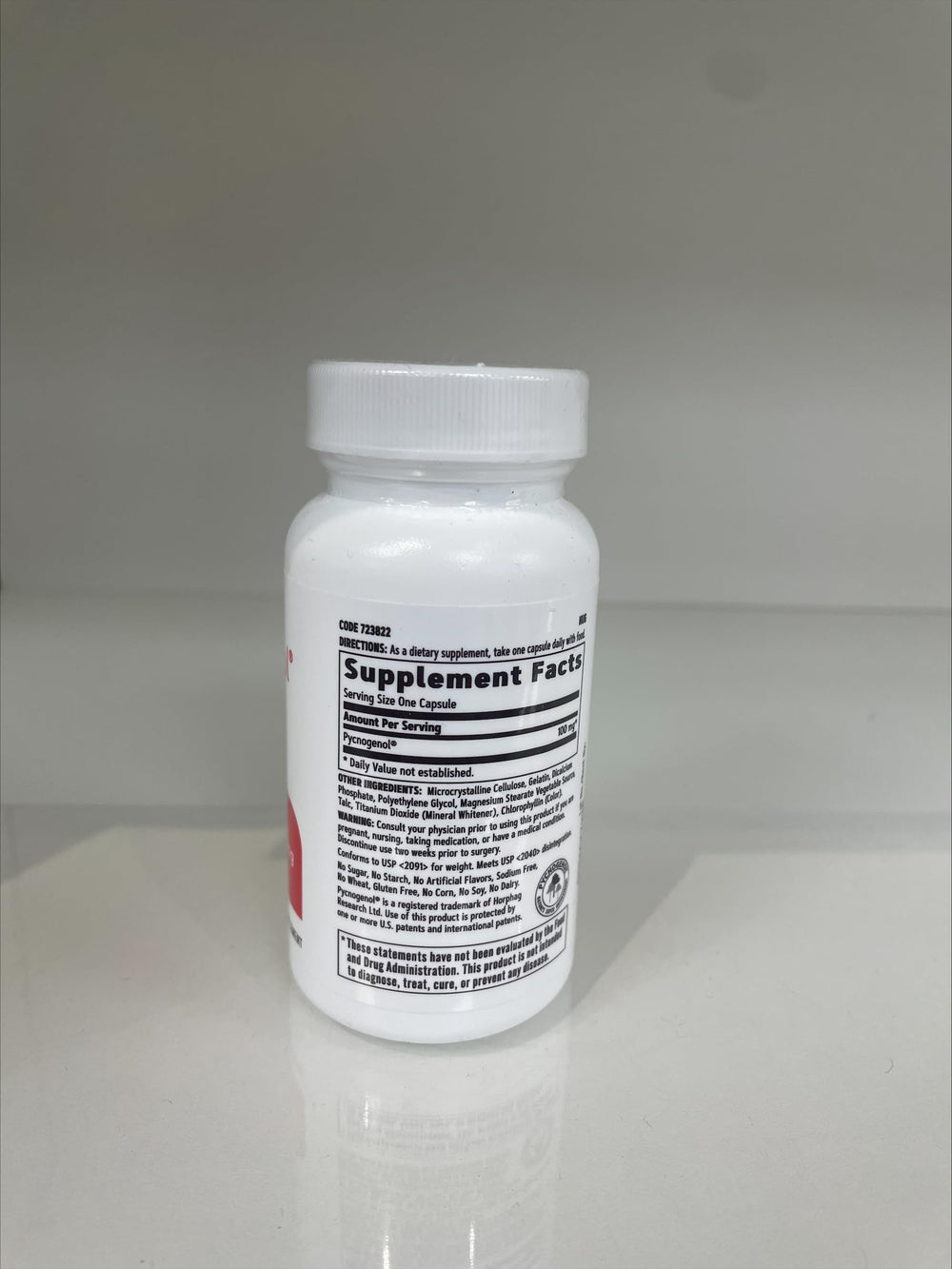 GNC Pycnogenol bottle label close-up emphasizing product name and circulatory health.