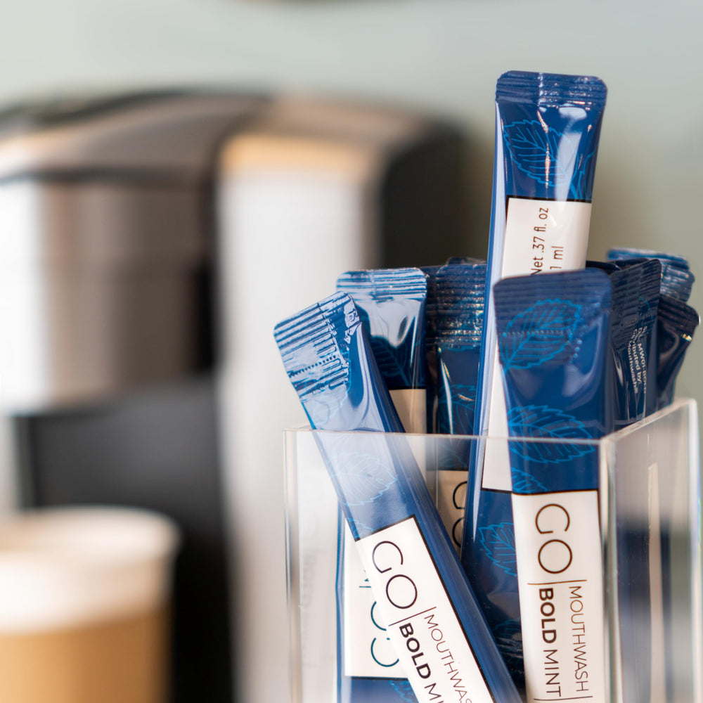 Go Mouthwash Bold Mint guest bathroom display, sleek packaging enhances guest experience.