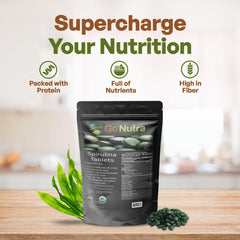 Go Nutra Spirulina tablets poured out showing small vegan tablets for easy daily use.