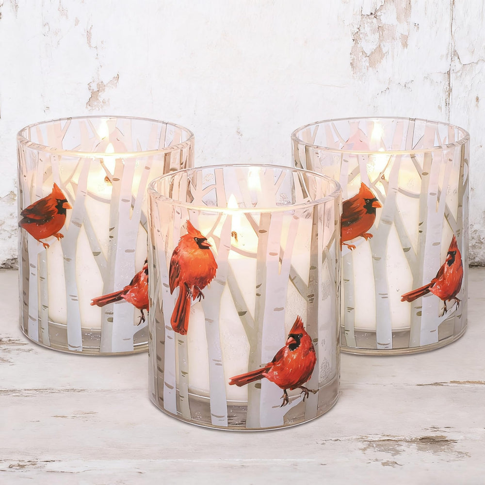 GORGE MOMENT cardinal candle in a jar enhances cozy holiday ambiance and birch-inspired decor.