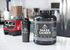 Gorilla Gulps mass gainer serving with spoon suggests meal replacement option.