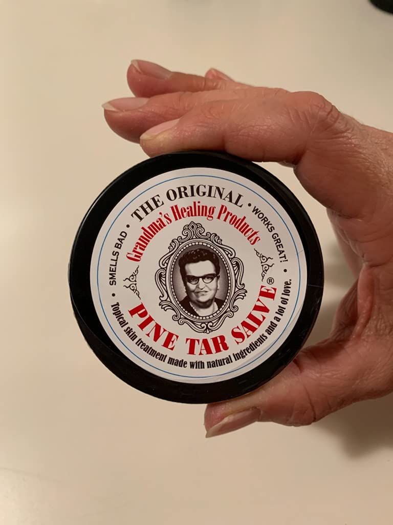Grandma's Pine Tar Salve jar label, traditional formula for time-tested skin comfort on minor injuries.