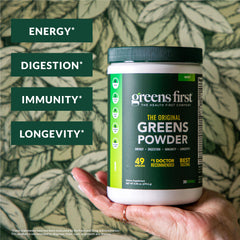 Greens First powder being mixed into water for quick nutrition.