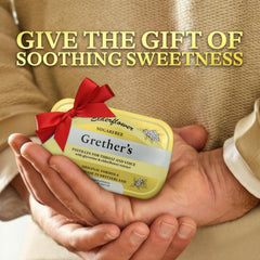 GRETHER'S Sugarfree Elderflower Pastilles lozenge on hand, portable moisture support on the go.