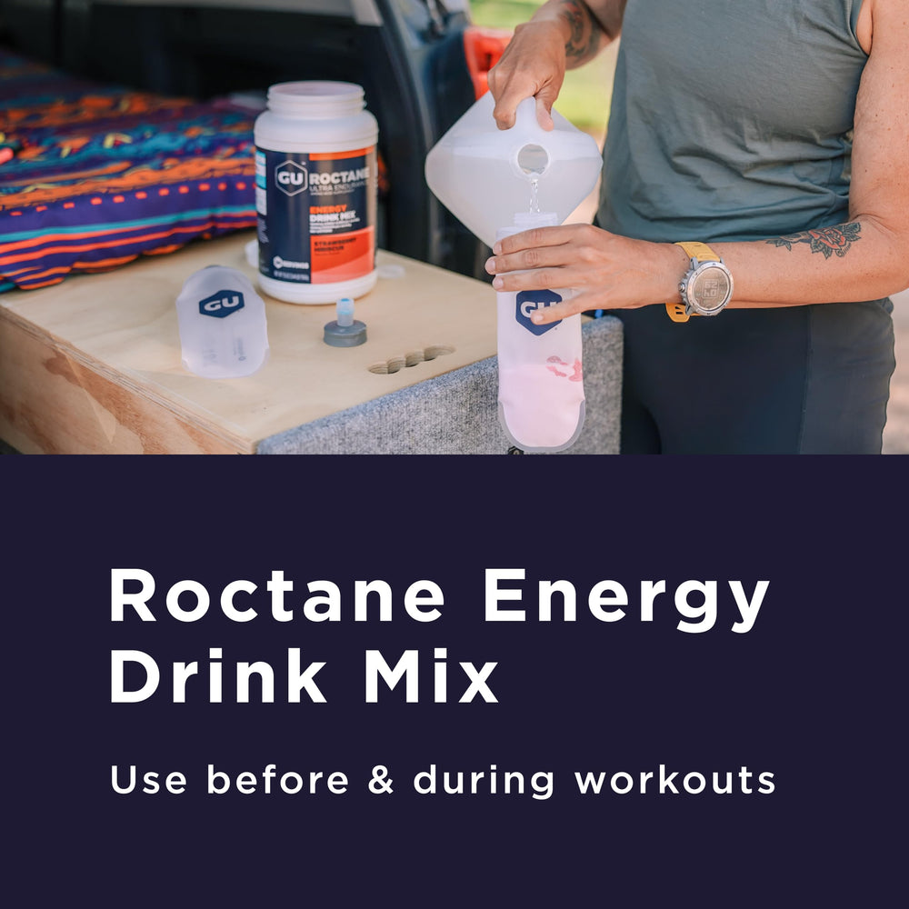 Roctane bottle being poured into a 21-ounce bottle for hydration