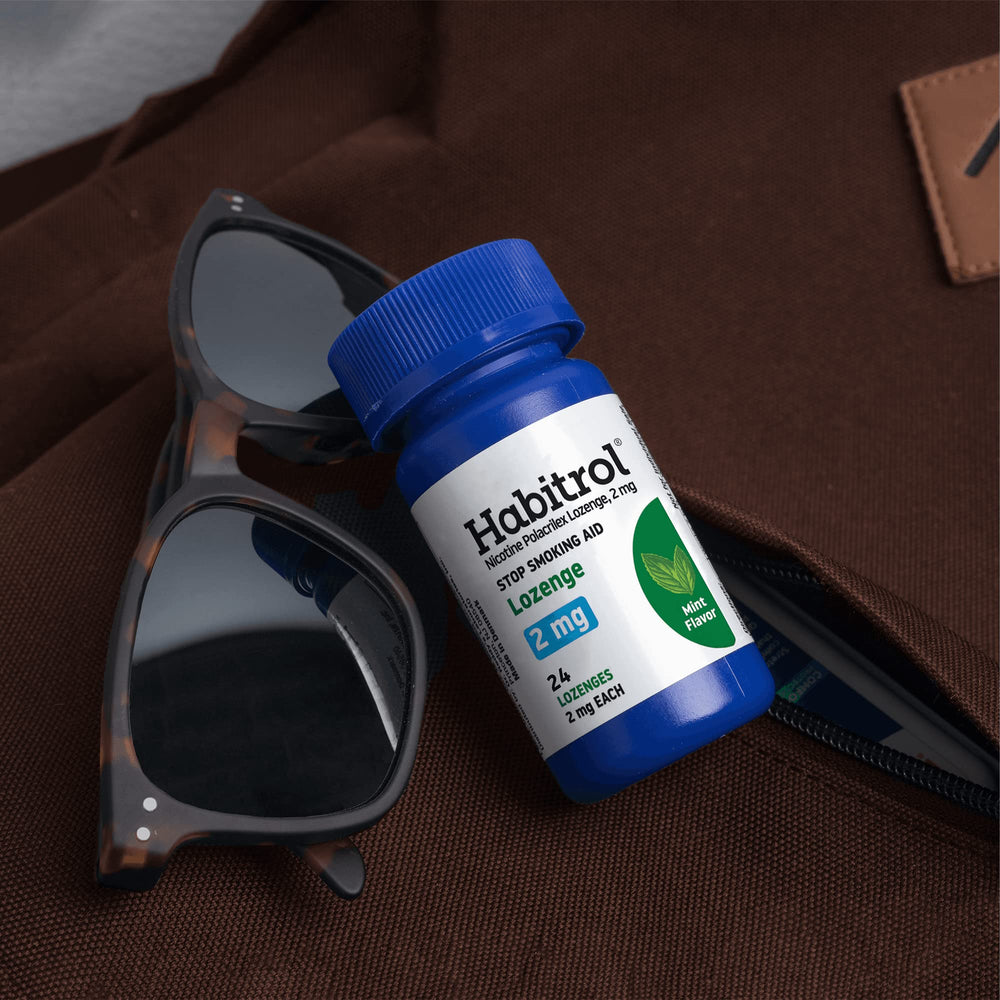 Habitrol mint lozenges close-up illustrates smooth melting texture