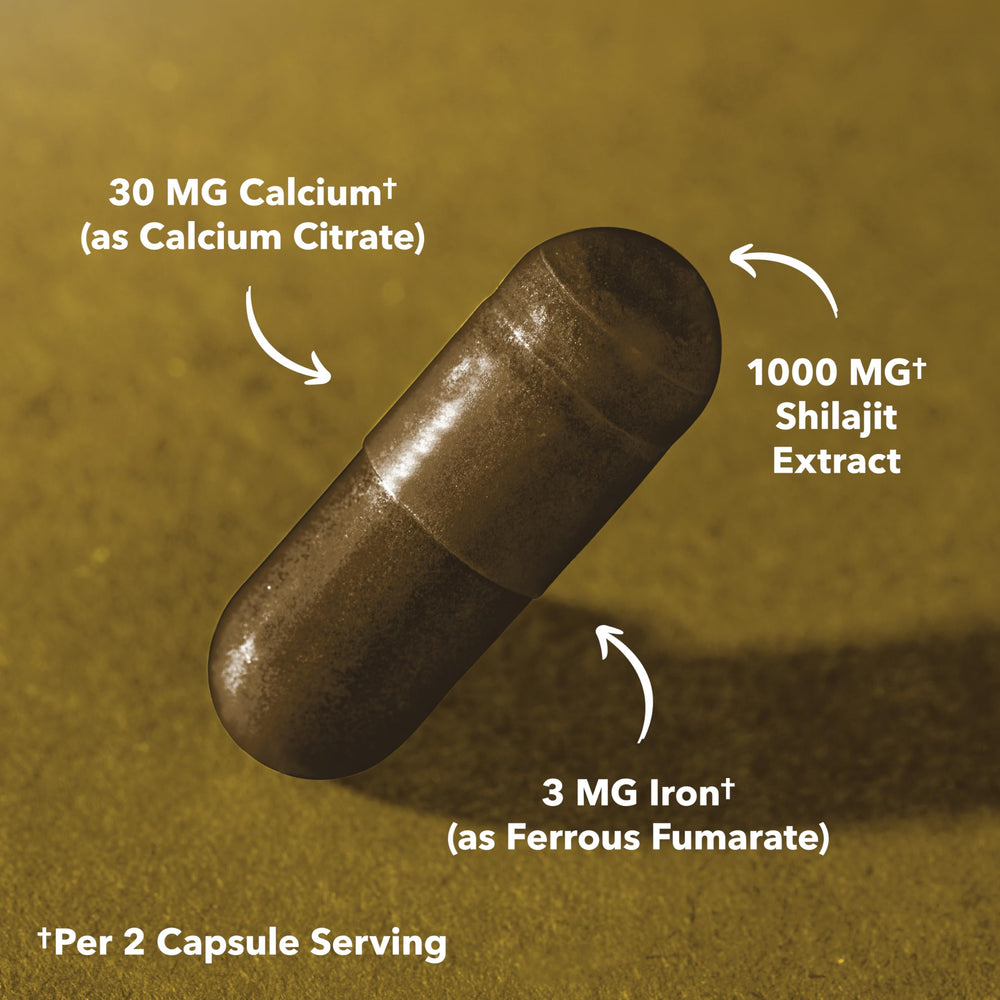 Havasu Shilajit Capsules on a natural wood surface in natural light.