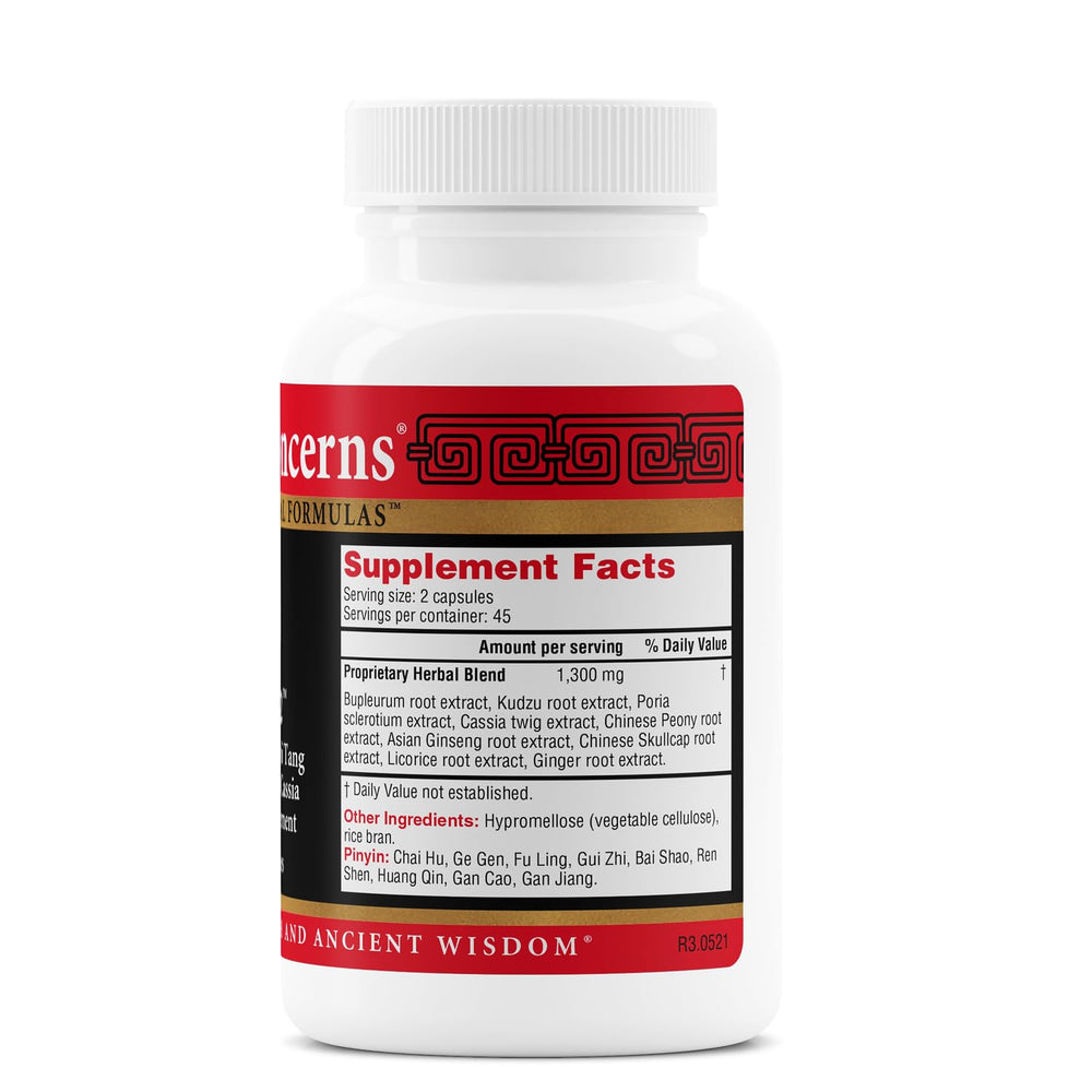 Health Concerns Ease 2 capsules closeup highlighting herbal blend.