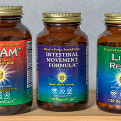 HealthForce SuperFoods capsules arranged for digestive regularity use.