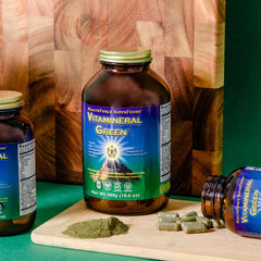 USA-made facility seal beside Vitamineral Green bottle.