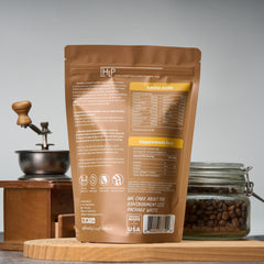 Healthy Living Proteins collagen powder scoop beside bottle for easy mixing