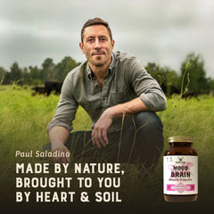 Heart & Soil glass bottle on wood table emphasizing premium quality