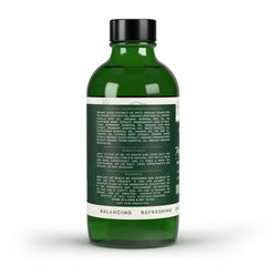 Heart Tone Botanicals natural, fluoride-free formula bottle supports daily holistic mouth care.