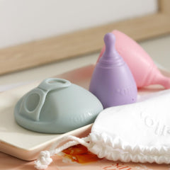 Hello Period average cervix cup removal with stem shows easy insertion and handling.