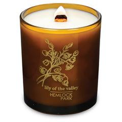 Hemlock Park Amber and Gold wood wick candle creates warm ambience with natural coconut wax, ideal for relaxation.