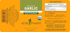 Herb Pharm garlic extract in a kitchen setting for wellness routine.