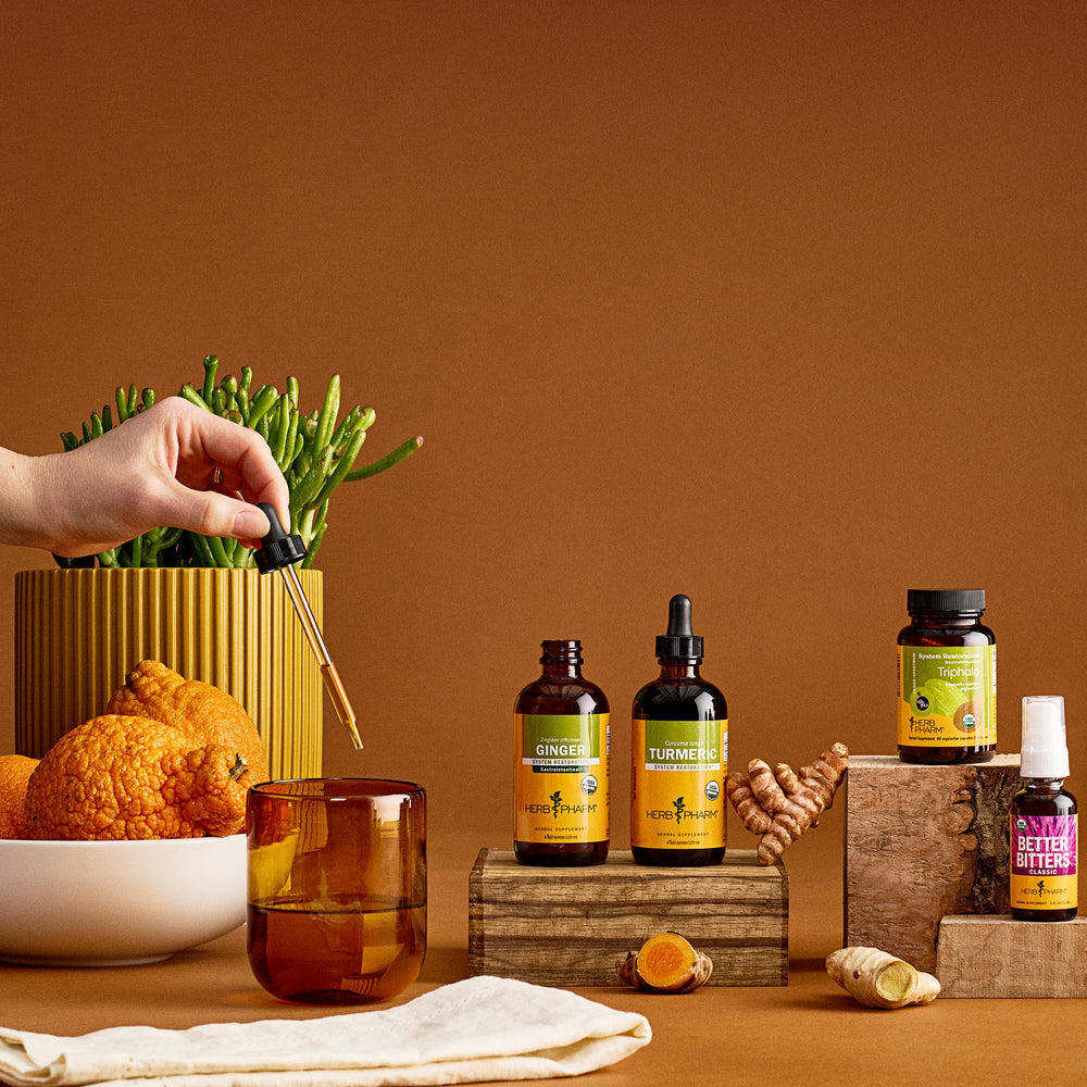 Herb Pharm turmeric liquid extract being poured into a glass