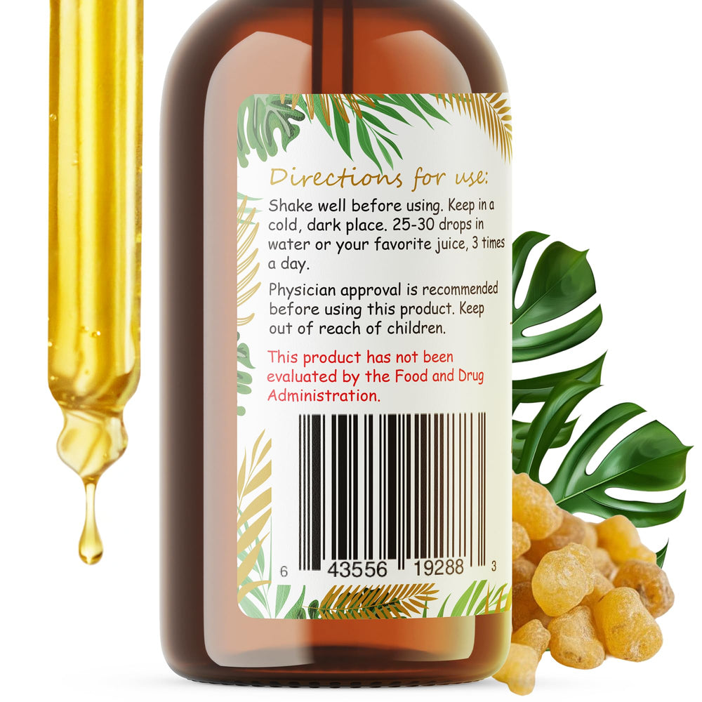 Bottled tincture being poured for convenient dosing