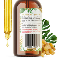 Bottled tincture being poured for convenient dosing