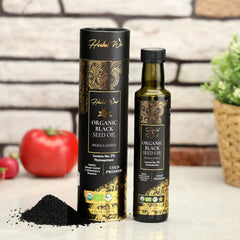 Herbal Wind oil with glass hints at cardiovascular and immune support potential.