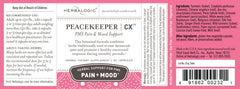 Peacekeeper CX capsules being poured for easy daily PMS support.
