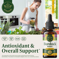 HERBAMAMA Burdock root drops in a glass of water for easy intake and hydration.