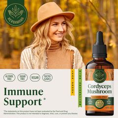 HERBAMAMA tincture dropper releasing Cordyceps into water for easy dosing.