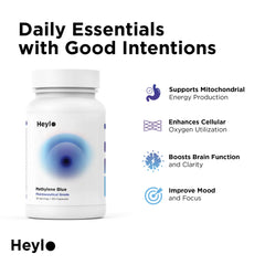 Heylo Health Methylene Blue capsules swallows-ready with glass of water demonstrating easy ingestion.