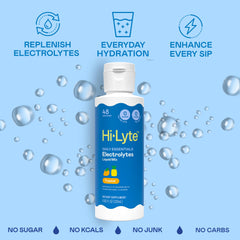 Hi-Lyte drops dissolving in water for fast, sugar-free hydration.