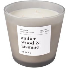 Hidden Label large candle in amber wood and jasmine for open living spaces.