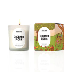 Homesick Orchard Picnic Candle jar creates cozy ambiance for gatherings and evenings