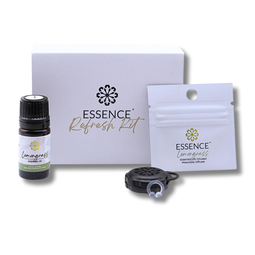 HONÉ Essence wearable lemongrass ring worn on ear for discreet aromatherapy.