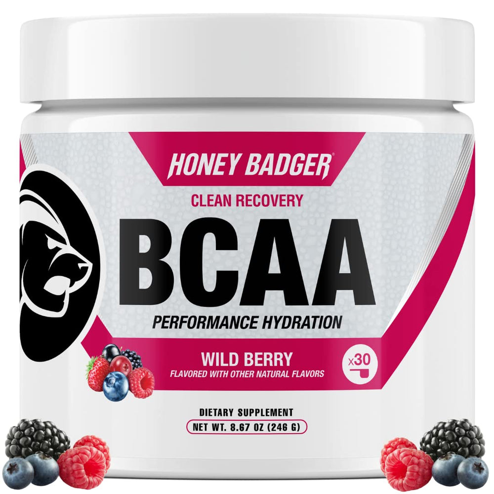 Honey Badger BCAA EAA powder tub in wild berry flavor for post-workout recovery.