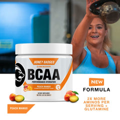 Honey Badger BCAA + EAA mixing glass with Peach Mango flavor for hydration after workouts.