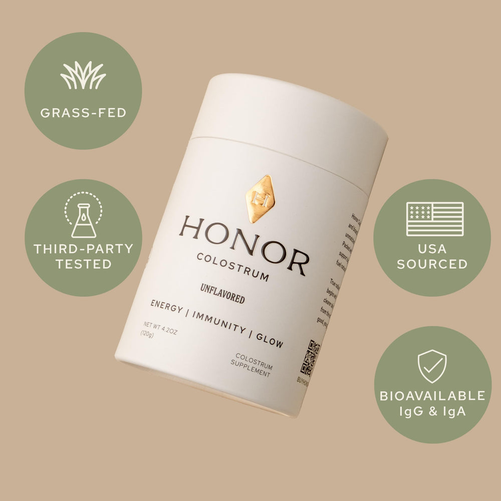 HONOR Supplements Colostrum powder scoop marks precise serving for daily use.