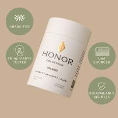 HONOR Supplements Colostrum powder scoop marks precise serving for daily use.