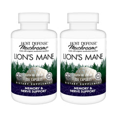 Host Defense Lion's Mane capsules bottle on wood for daily focus support.