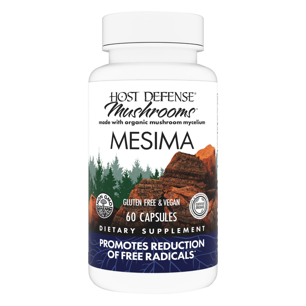 Host Defense Mesima capsules bottle on countertop suggests immune support potential.
